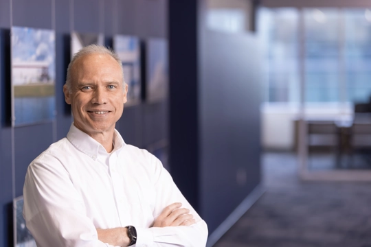 portrait of a smiling person in professional attire